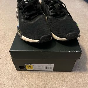 Men’s Adidas NMD black.